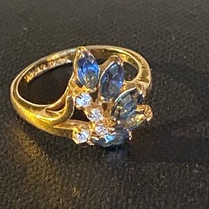 Vintage Ring: Inscription not Legible. Simulated Sapphire and Clear Stones.